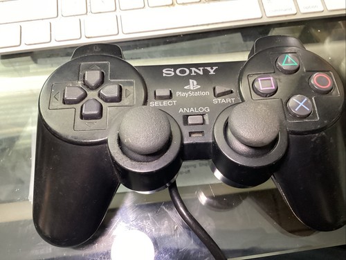 Black dual shock controller - shock,