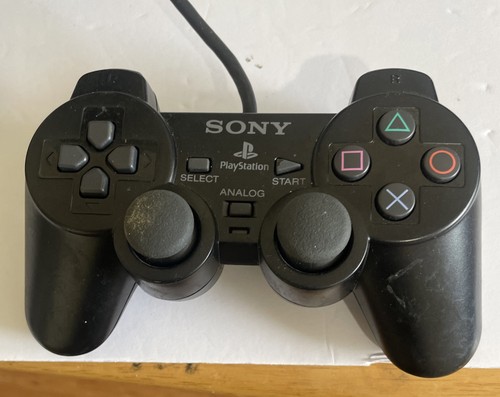 Black dual shock controller - dual,