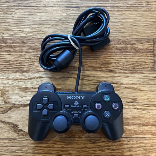 Black dual shock controller - dual,