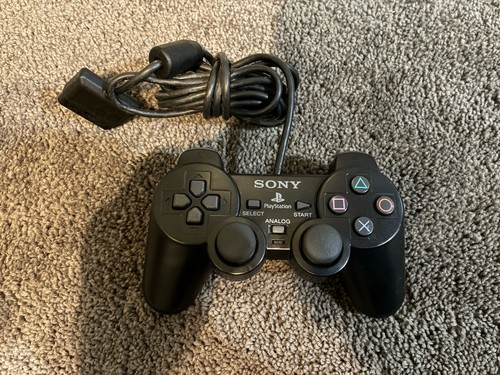 Black dual shock controller - shock,